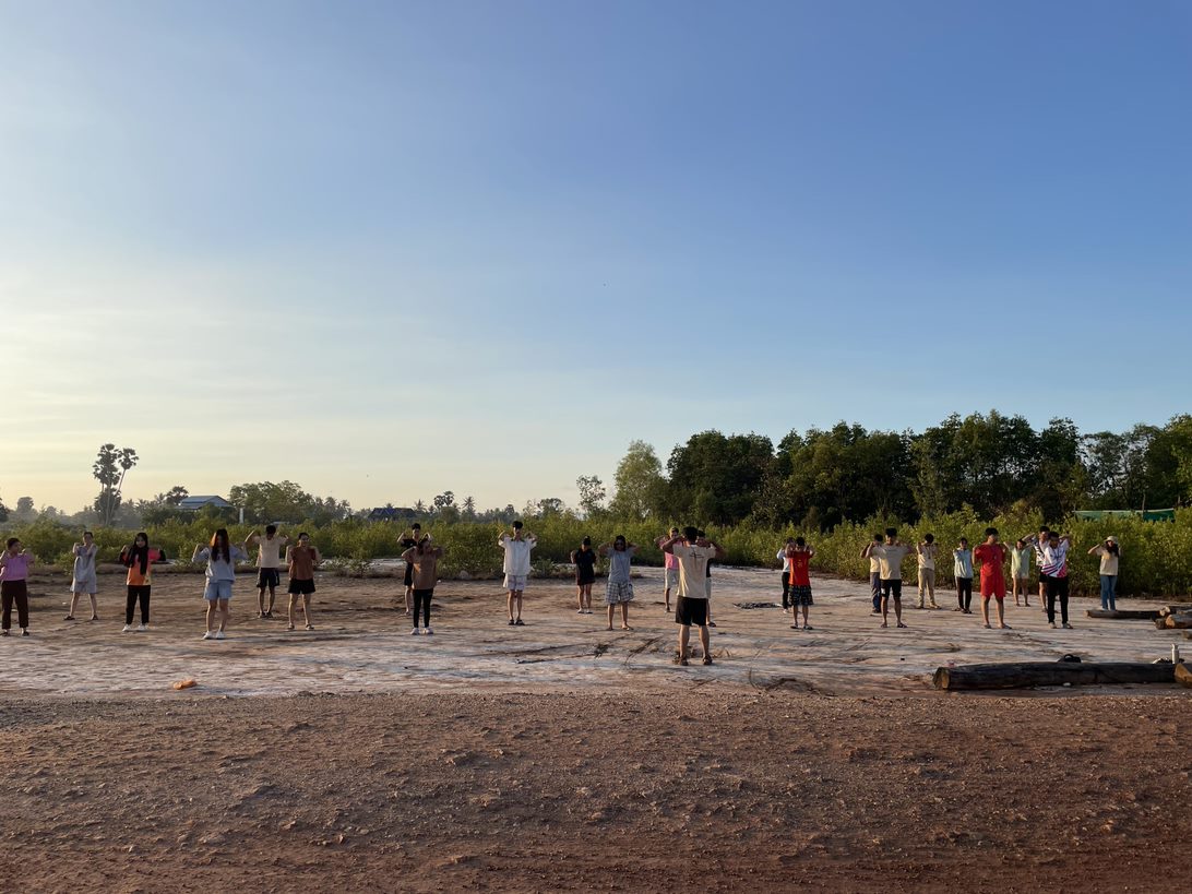Morning team building activity of youths.